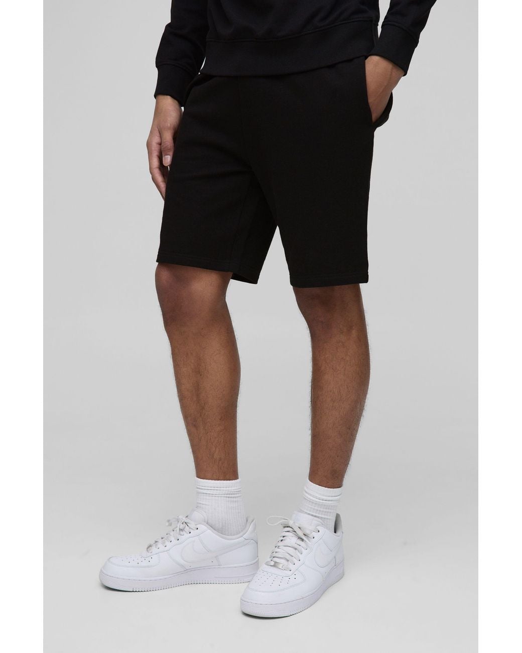 BoohooMAN Black Lightweight Basic Slim Fit Mid Length Shorts for men