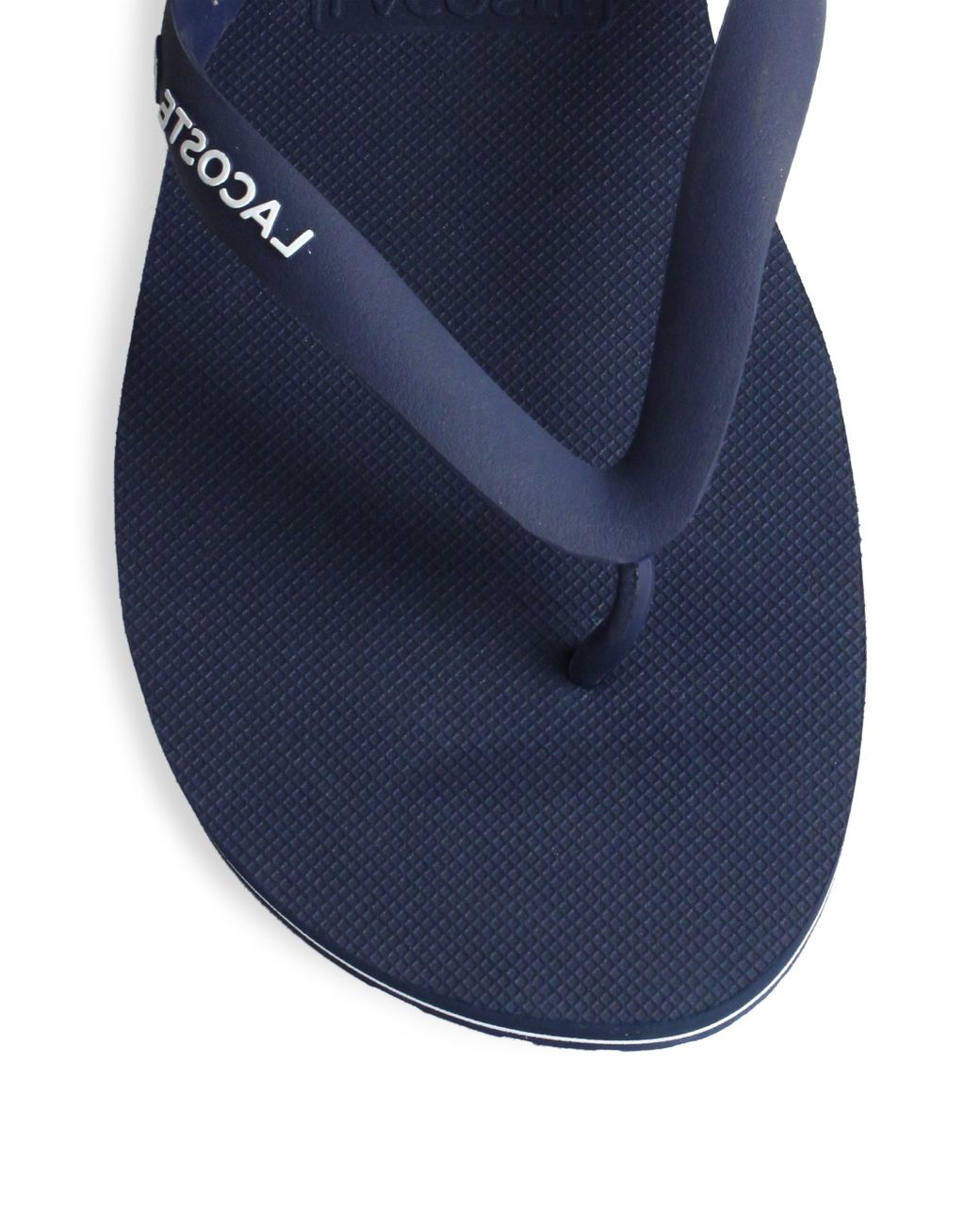 red lacoste flip flops