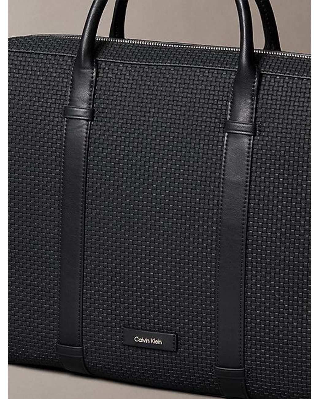 Calvin Klein Gray Embossed Woven Commuter Bag for men