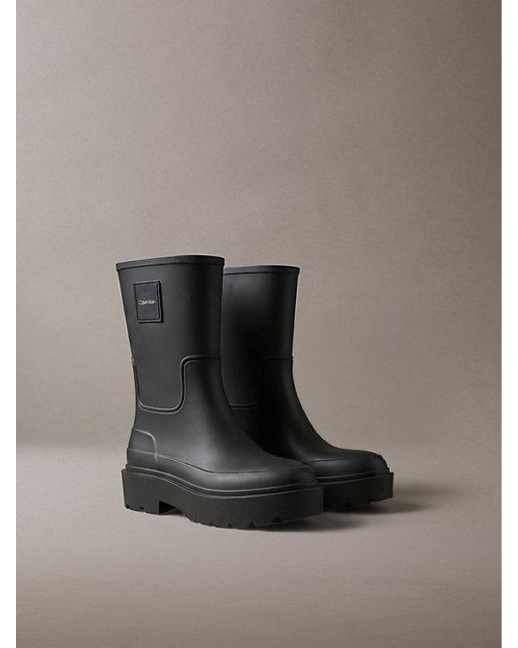 Calvin Klein Black Heeled Flexible Lug Sole Rain Boots