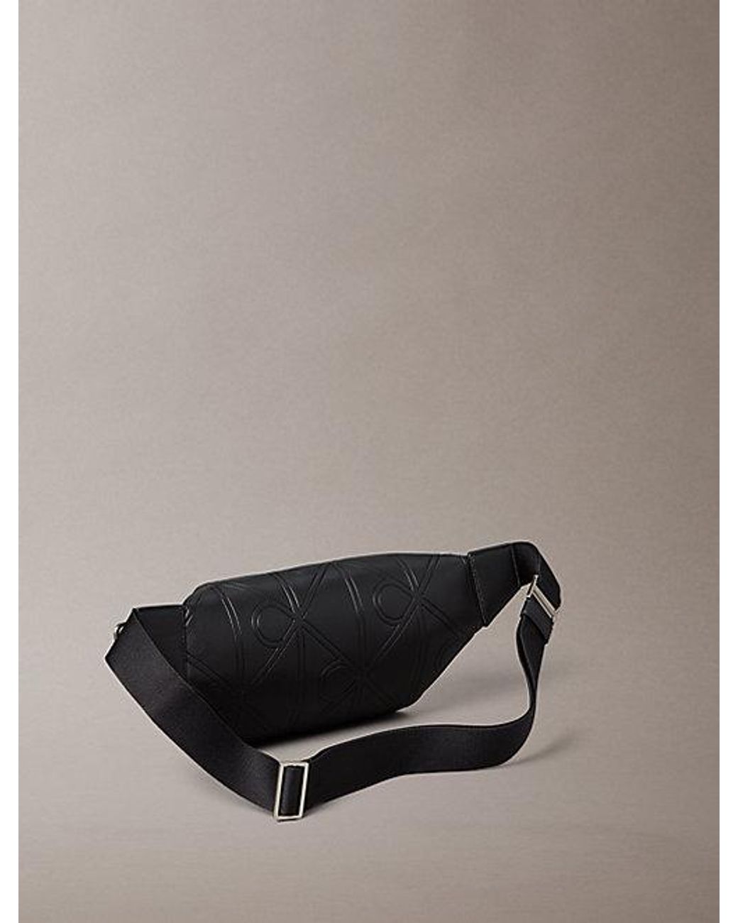Calvin Klein Black Embossed Emblem Logo Bum Bag for men