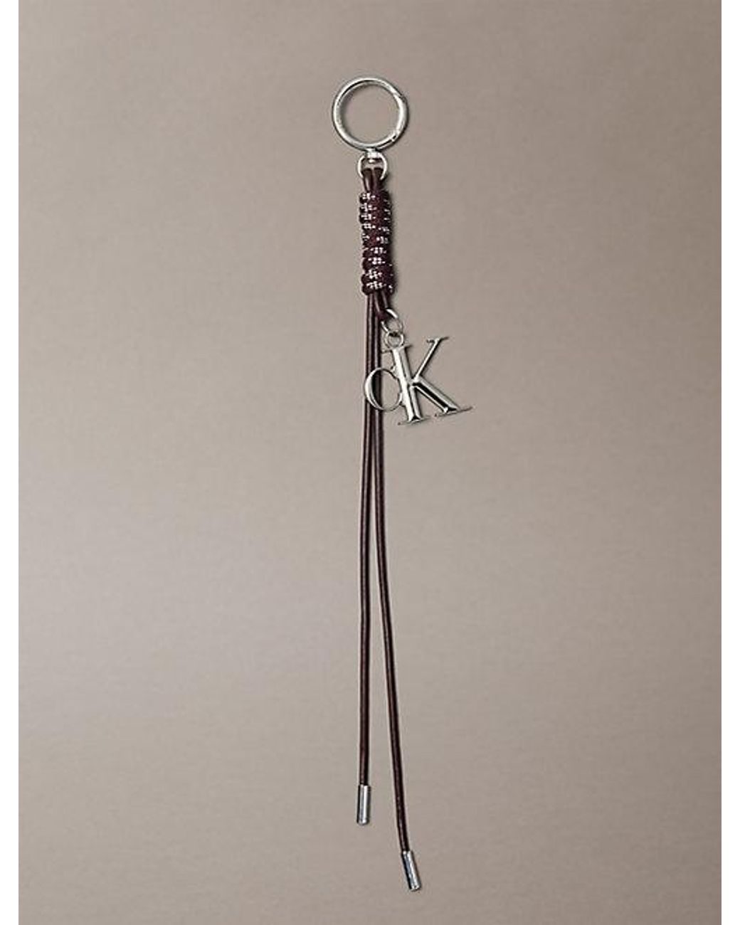Calvin Klein Gray Knotted Tassel Logo Bag Charm