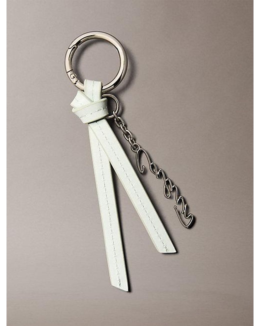 Calvin Klein White Leather Knotted Tassel Logo Bag Charm