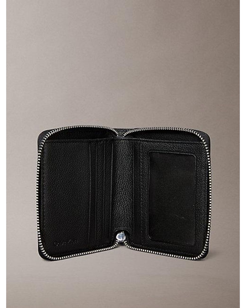 Calvin Klein Black Allover Monogram Logo Zip Bifold Wallet for men