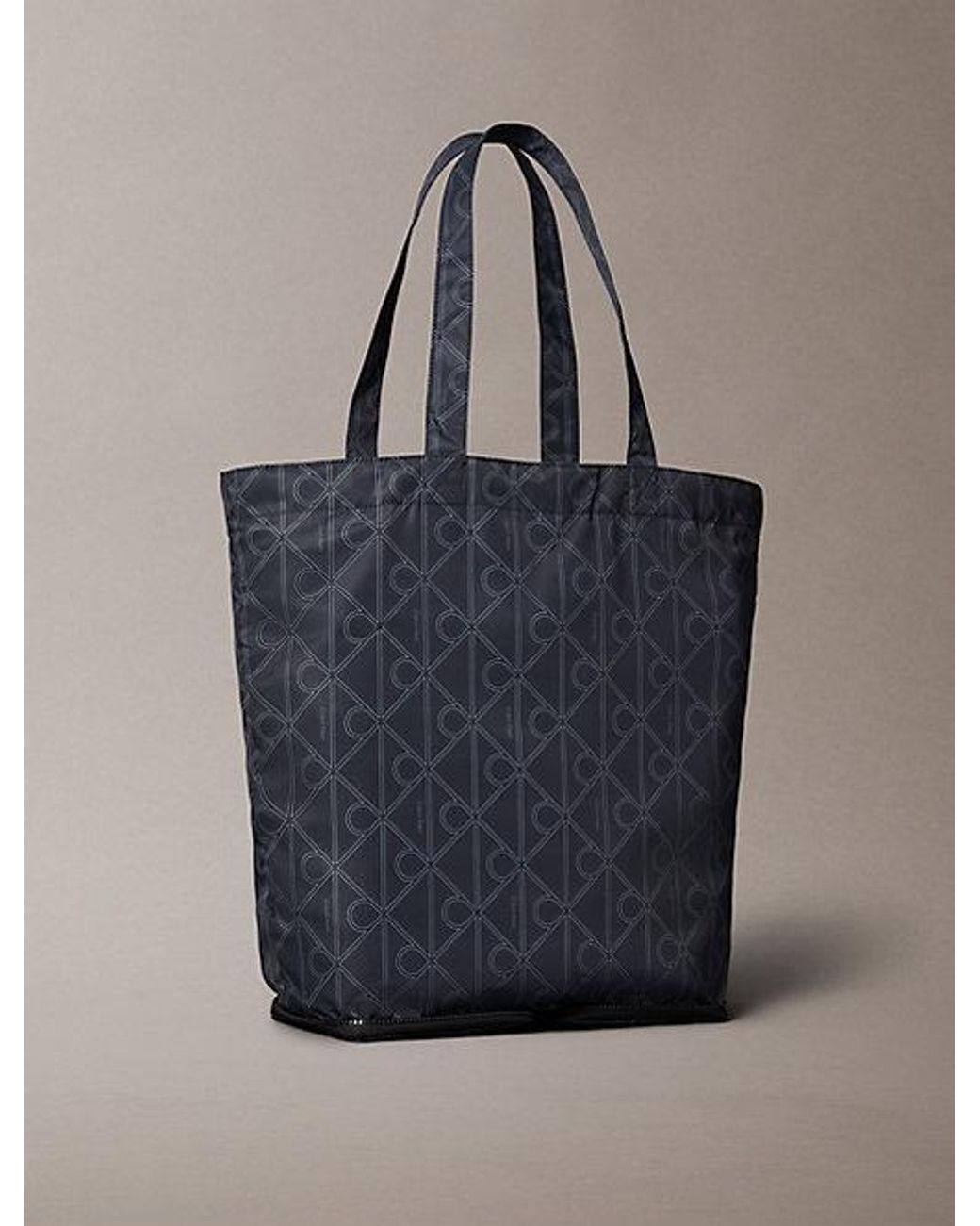 Calvin Klein Blue Printed Emblem Logo Nylon Packable Tote Bag for men
