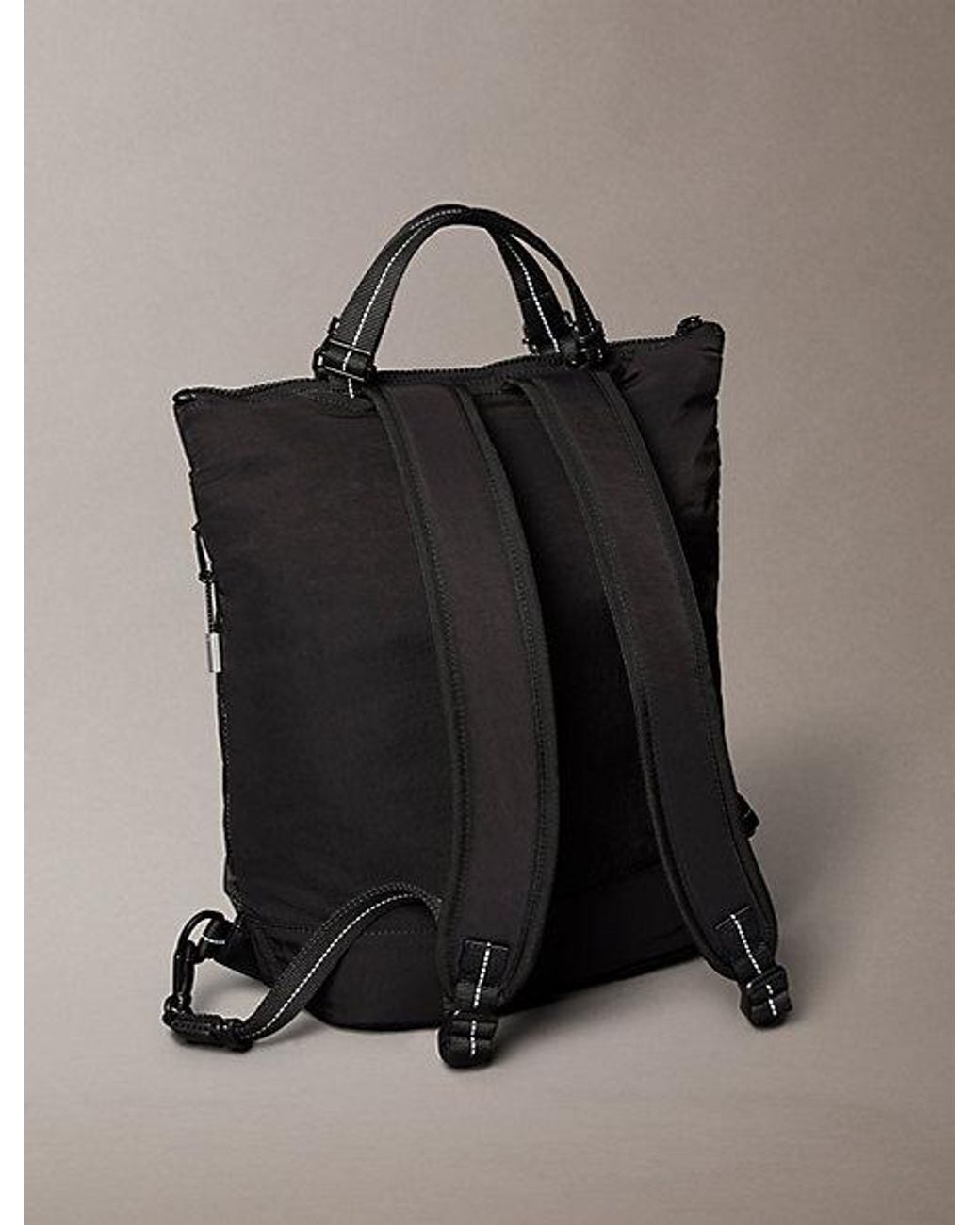 Calvin Klein Black Striped Utility Zip Convertible Helmet Bag for men