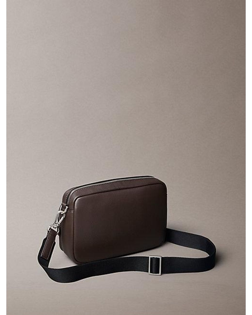 Calvin Klein Gray Logo Pebbled Crossbody Camera Bag for men