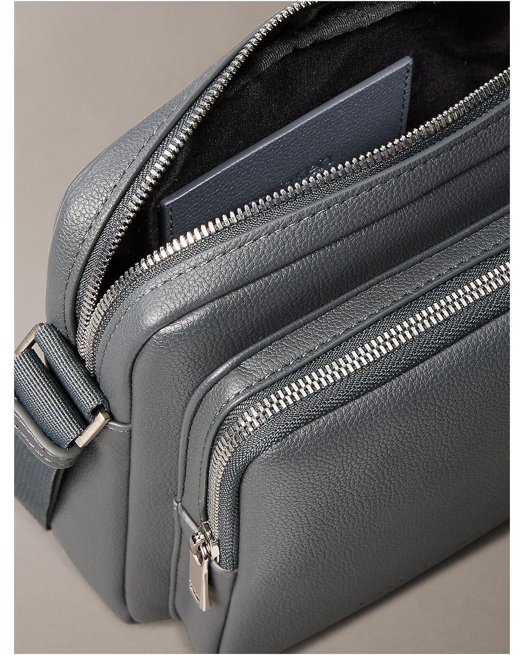 ★ ★ Men's CK Micro Pebble Messenger Bag 4D3034G Messenger Bag | Calvin Klein