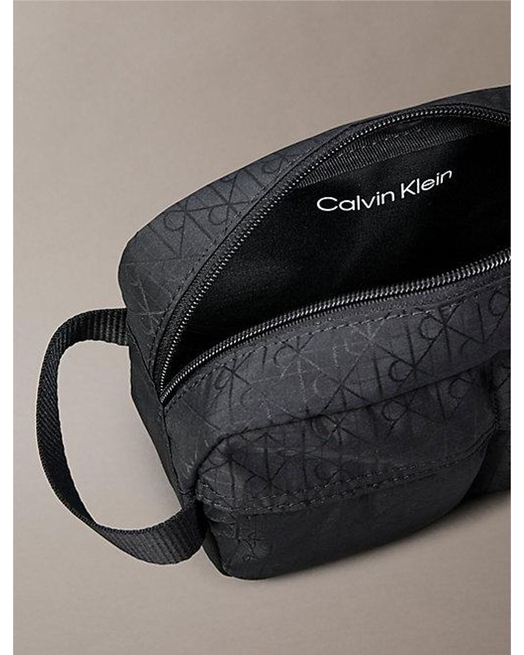 Calvin Klein Black Allover Emblem Logo Jacquard Wash Bag for men