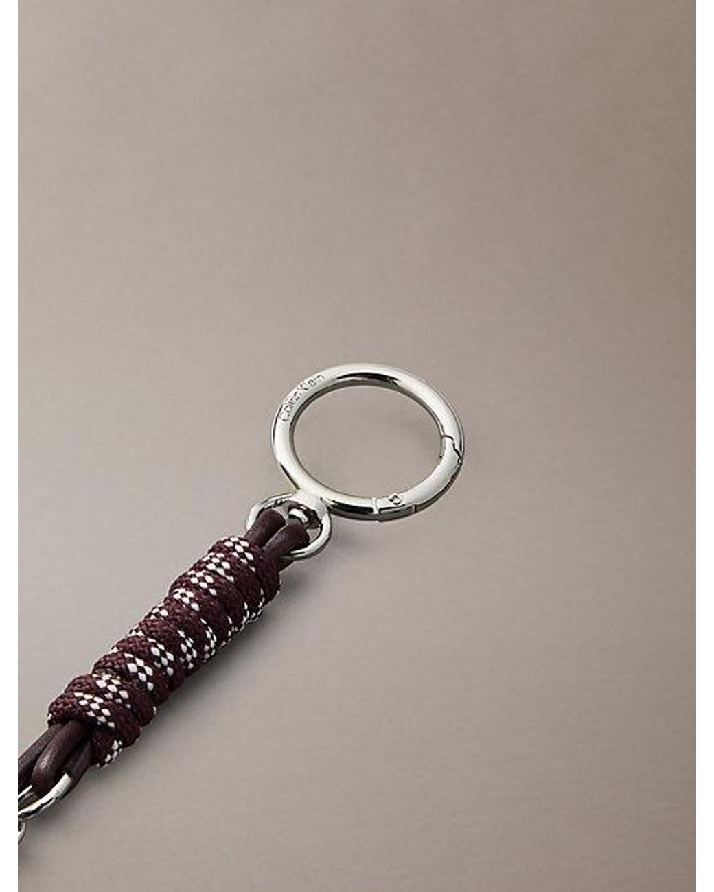 Calvin Klein Gray Knotted Tassel Logo Bag Charm