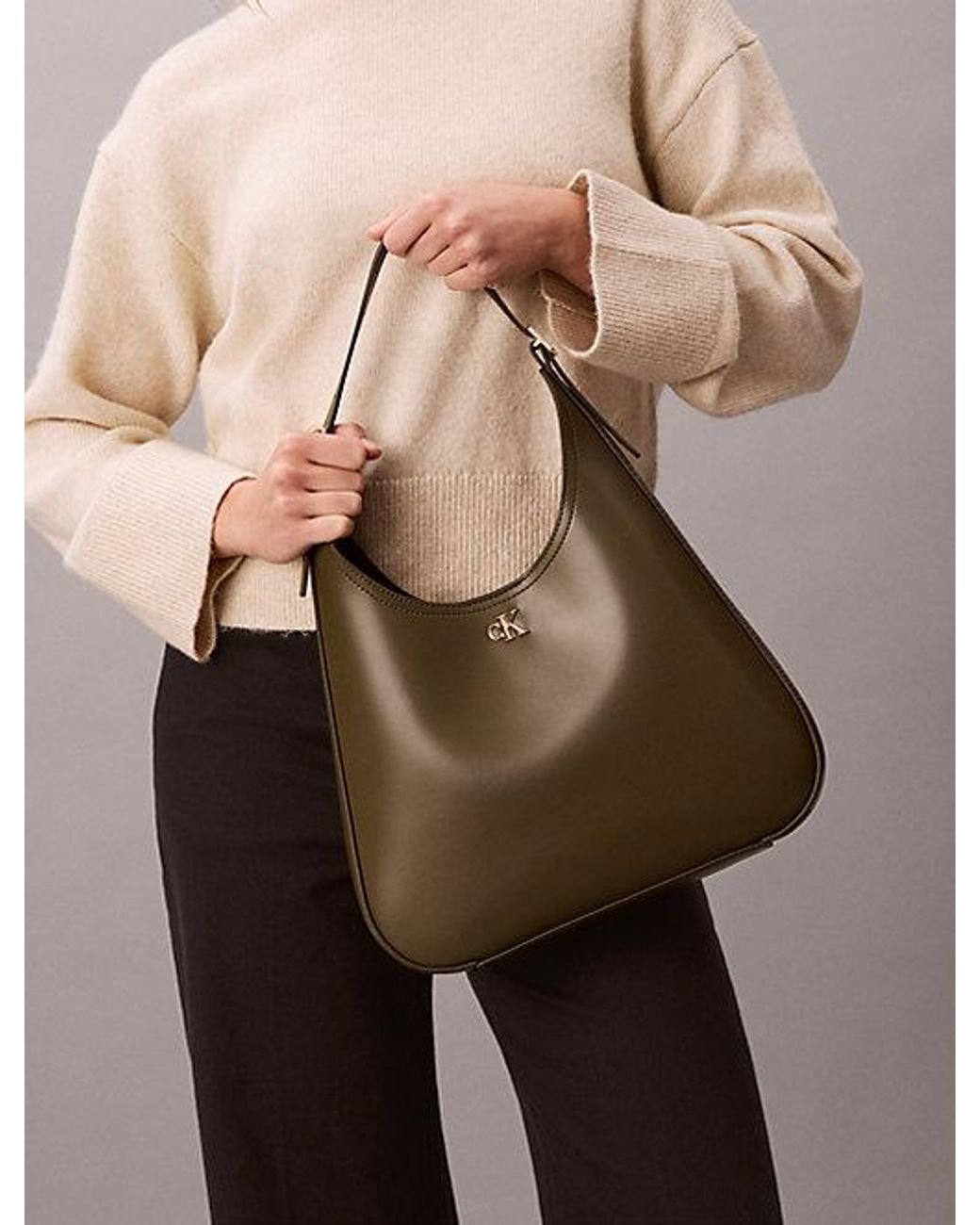 Calvin Klein Green Monogram Hardware Curved Shoulder Bag