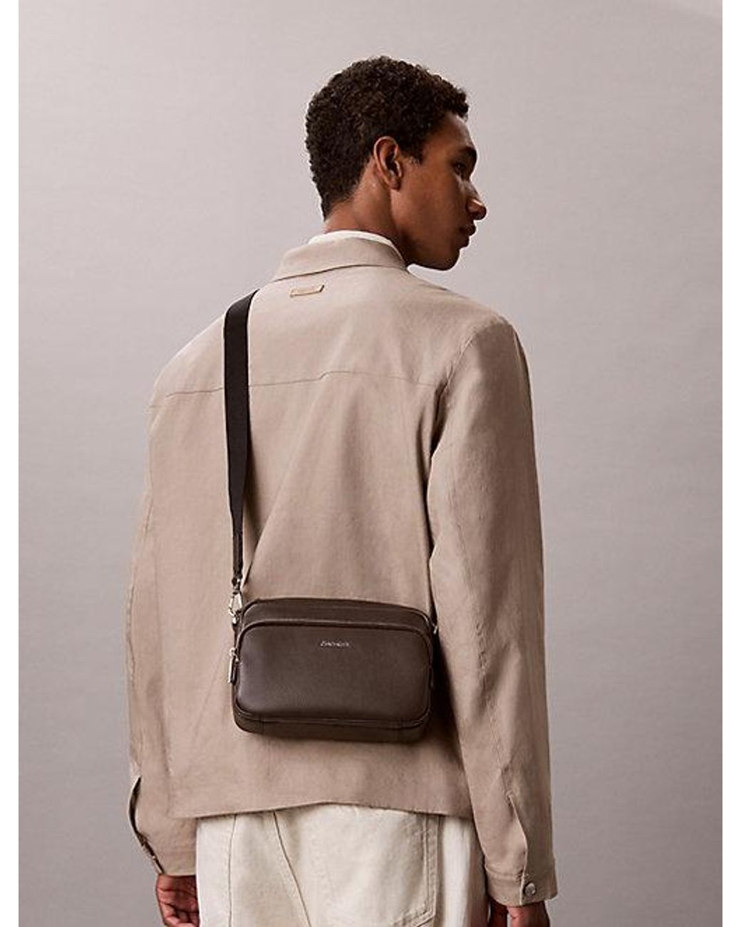 Calvin Klein Gray Logo Pebbled Crossbody Camera Bag for men