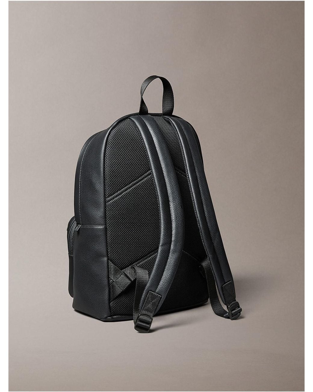 Calvin Klein Gray Pebbled Round Backpack for men