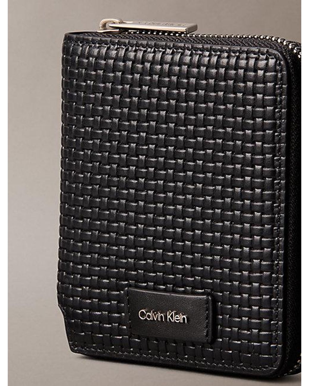 Calvin Klein Black Embossed Woven Zip Billfold Wallet for men