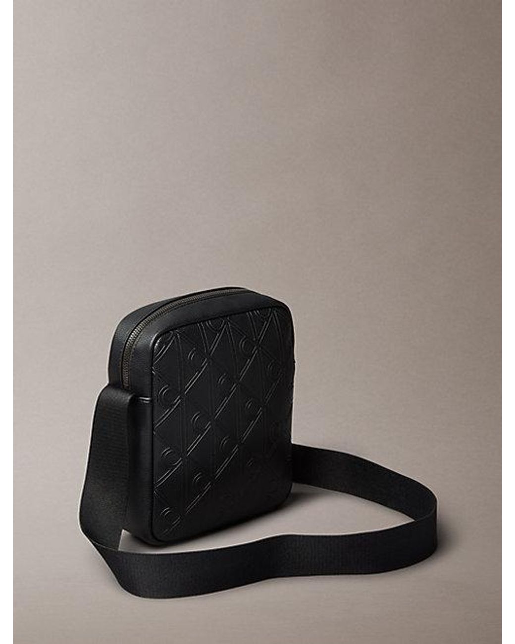 Calvin Klein Black Embossed Emblem Logo Reporter Bag for men