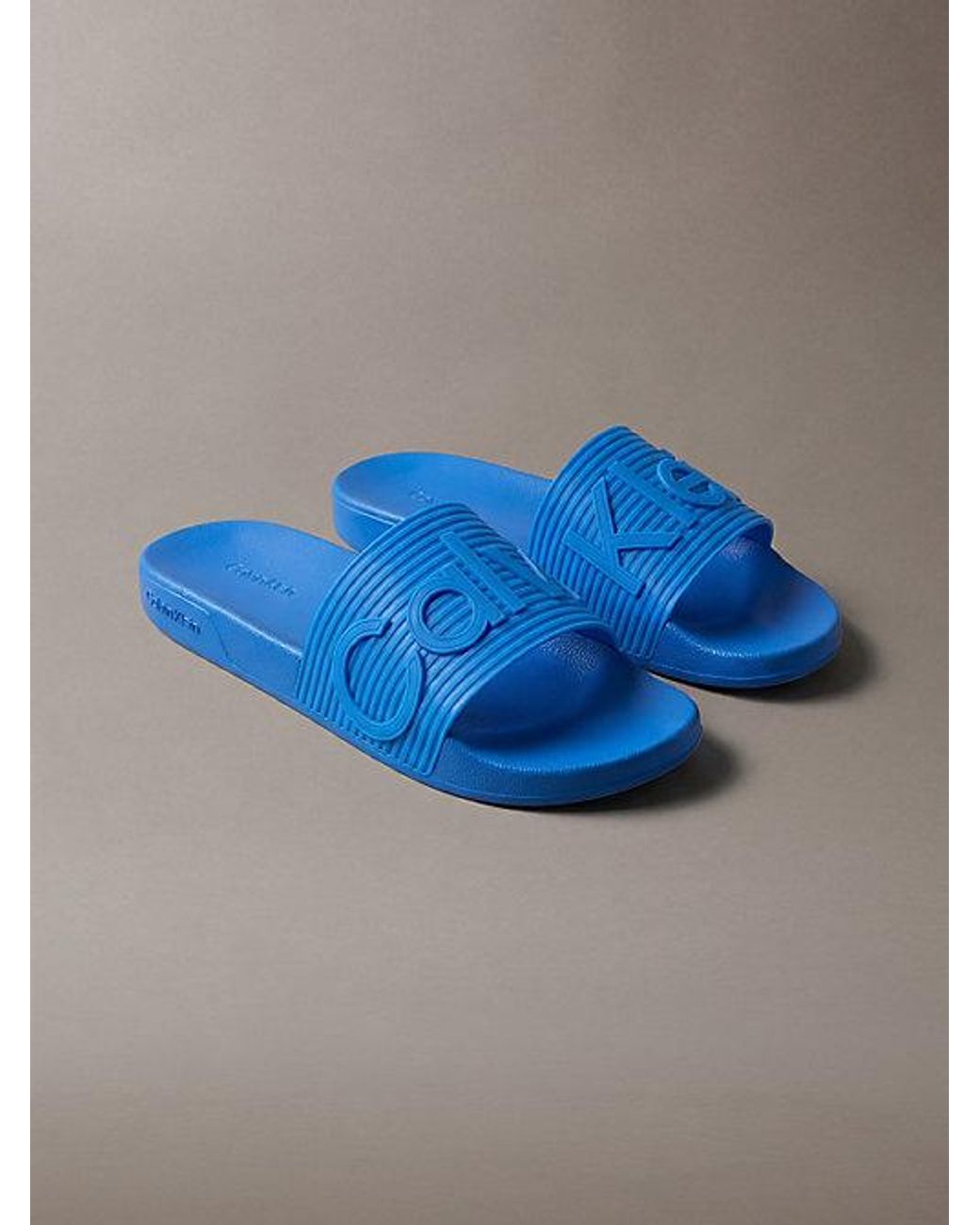 Calvin Klein Blue Nemo Contoured Emblem Logo Sliders for men