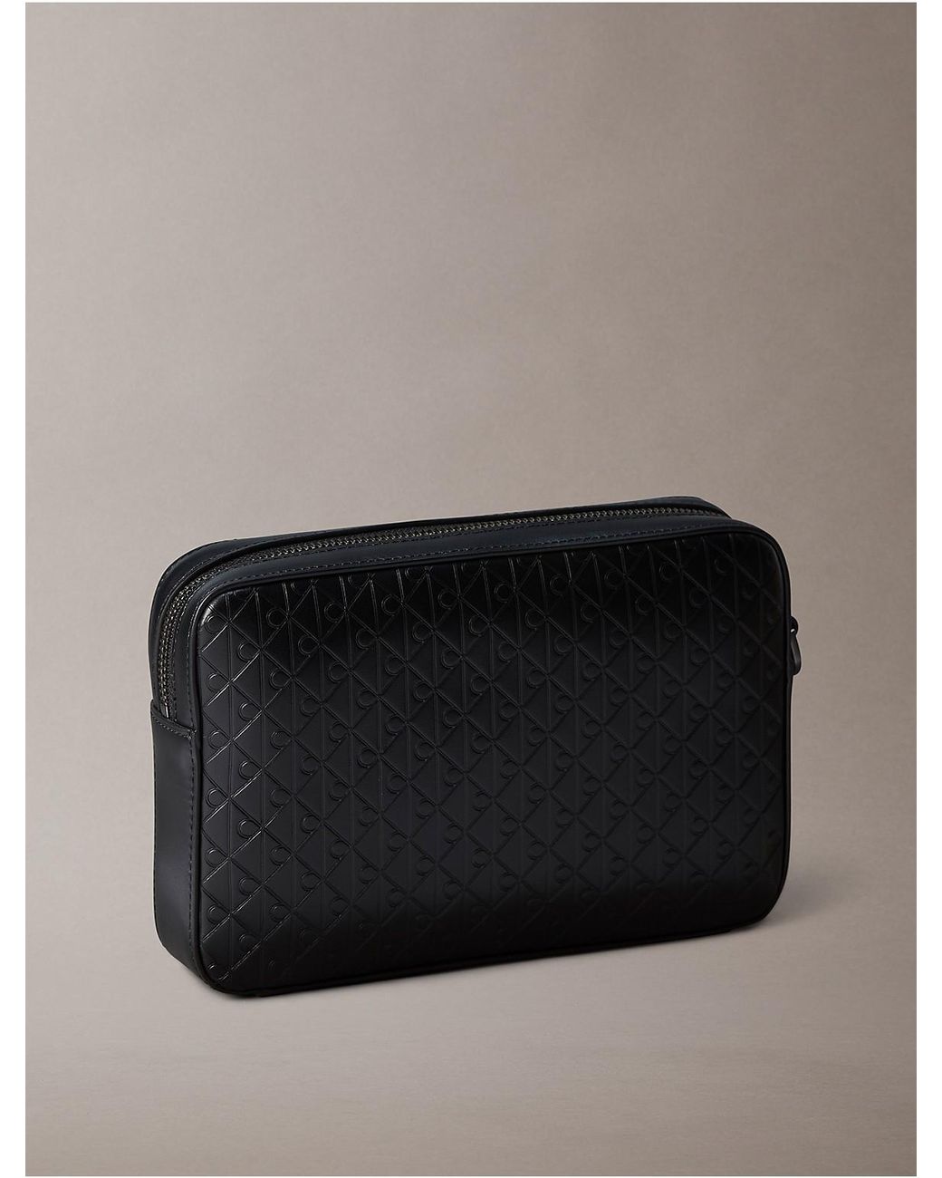 Calvin Klein Gray Allover Emblem Logo Pouch for men