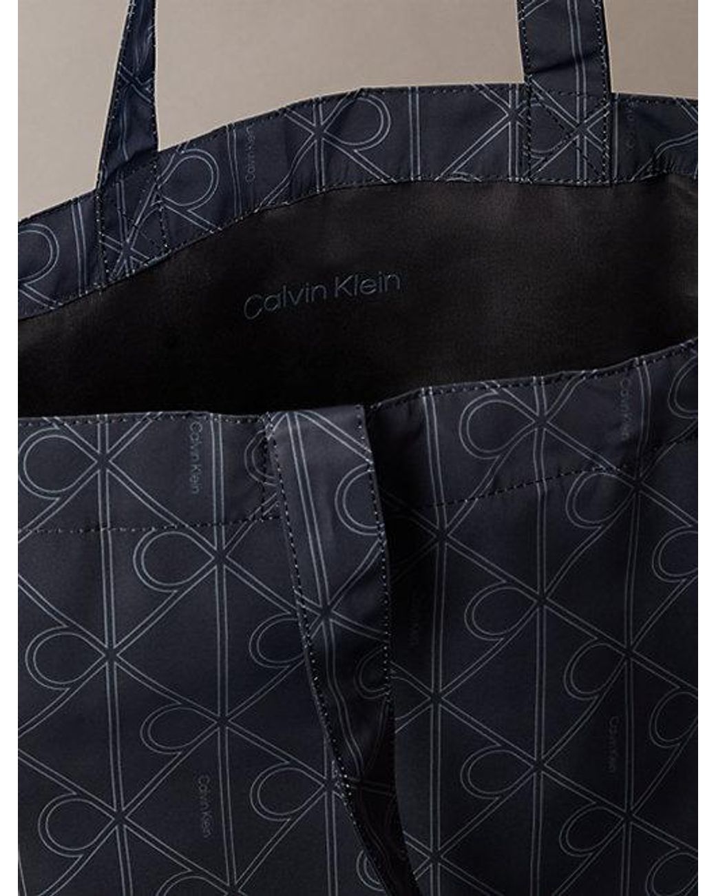 Calvin Klein Blue Printed Emblem Logo Nylon Packable Tote Bag for men