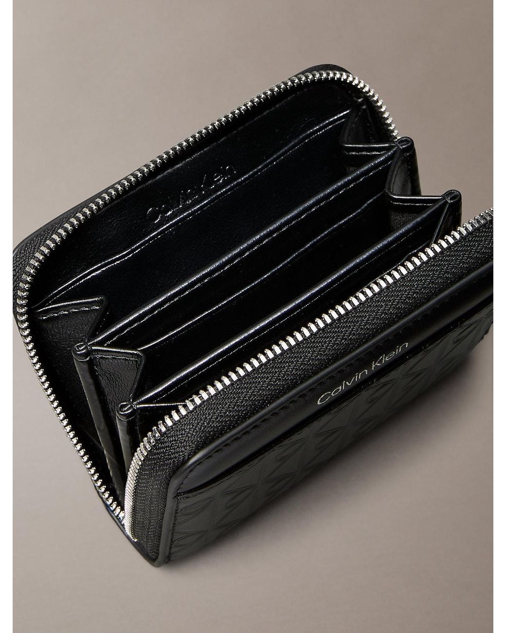 Calvin Klein Gray Embossed Emblem Logo Zip Wallet