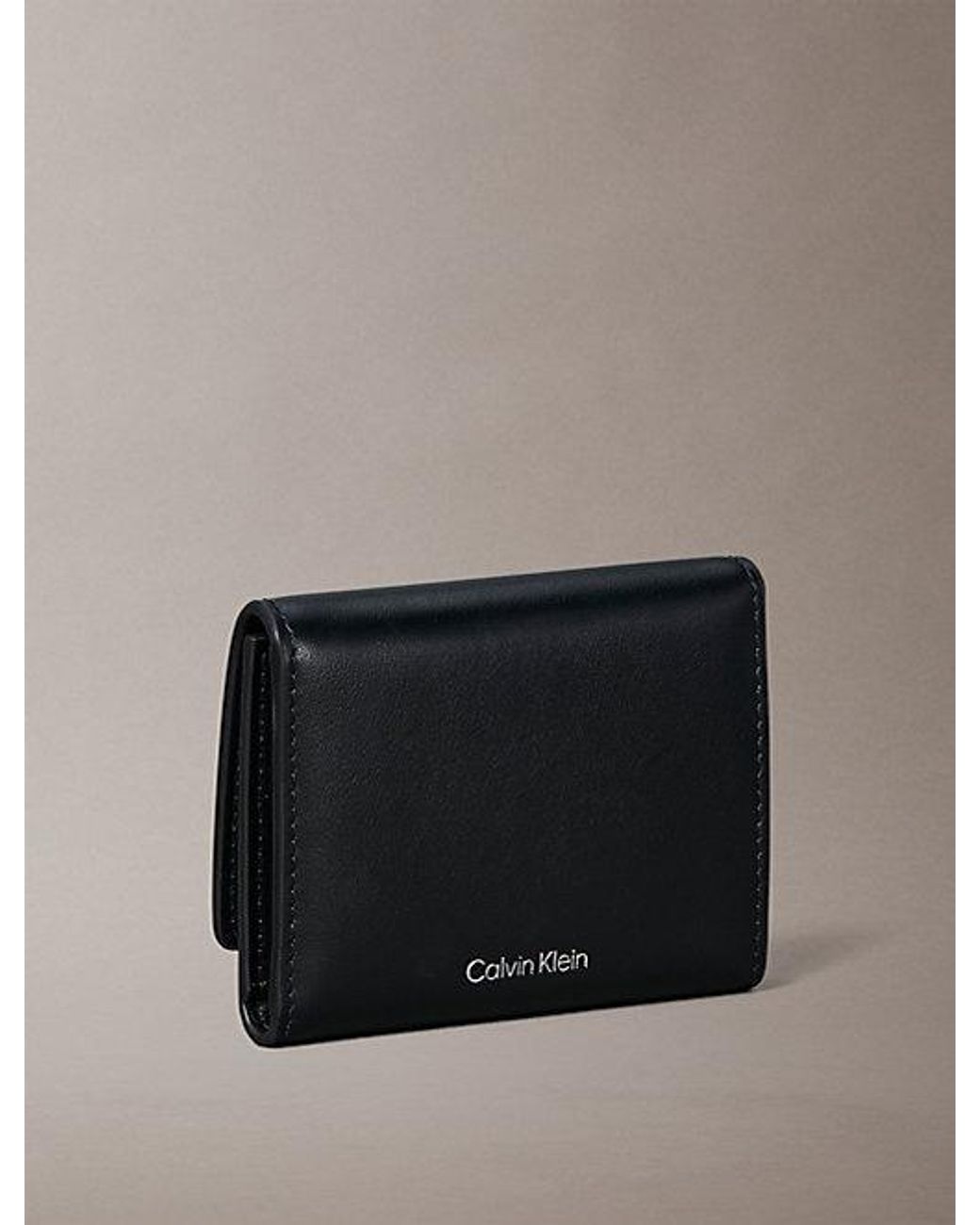 Calvin Klein Gray Monogram Logo Emblem Leather Trifold Wallet