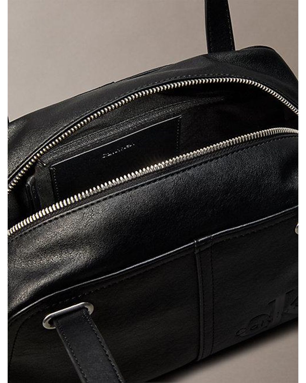 Calvin Klein Black Embossed Monologo Shoulder Bag