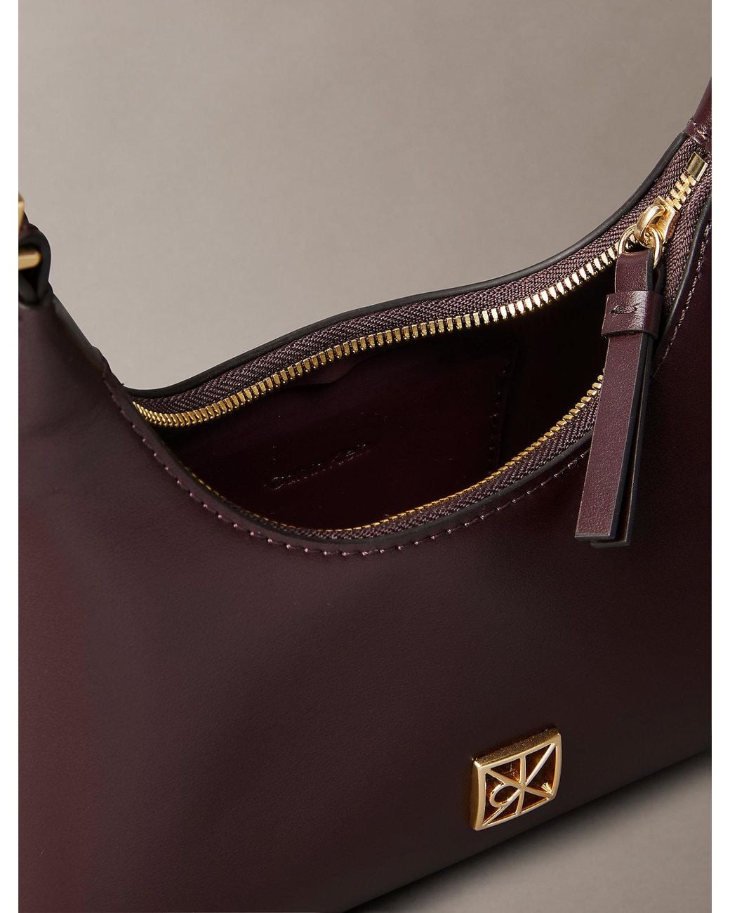 Calvin Klein Brown Monogram Logo Emblem Leather Small Shoulder Bag