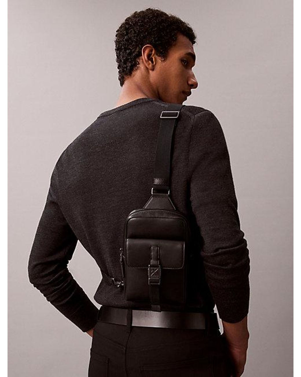 Calvin Klein Black Emblem Logo Sling Bag for men