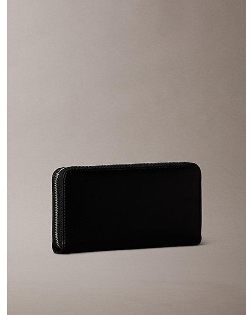 Calvin Klein Multicolor Embossed Monogram Long Zip Wallet