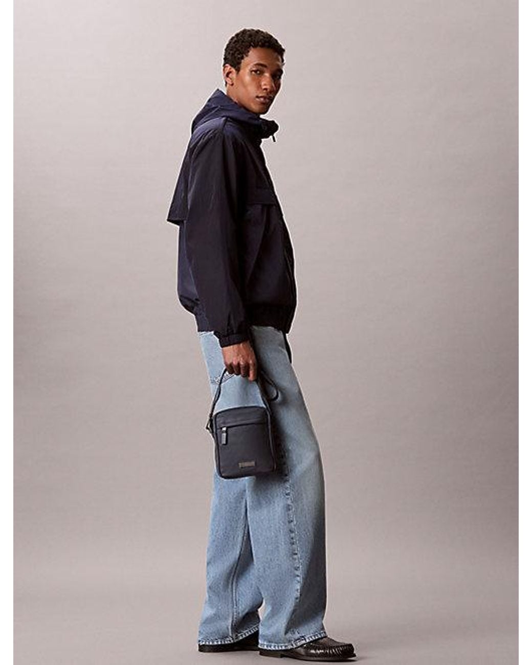 Calvin Klein Blue Water Repellent Nylon Reporter Bag for men