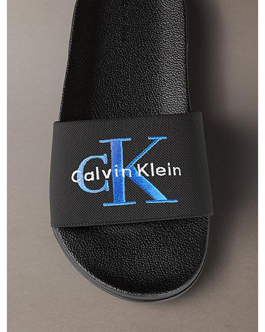 Calvin Klein Gray Canvas Contoured Logo Sliders for men