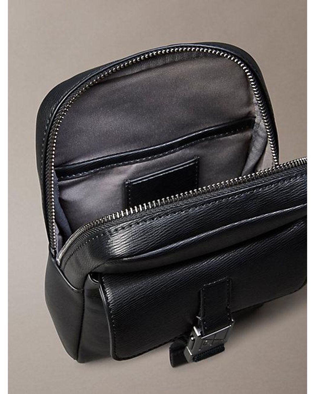 Calvin Klein Black Emblem Logo Sling Bag for men