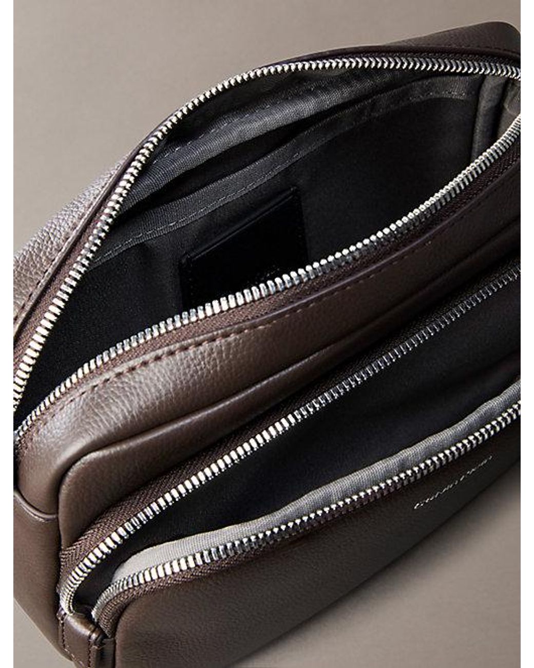 Calvin Klein Gray Logo Pebbled Crossbody Camera Bag for men