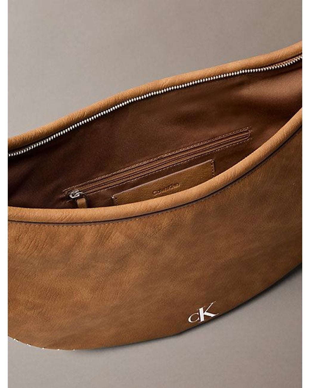 Calvin Klein Brown Convertible Studded Crescent Hobo Bag