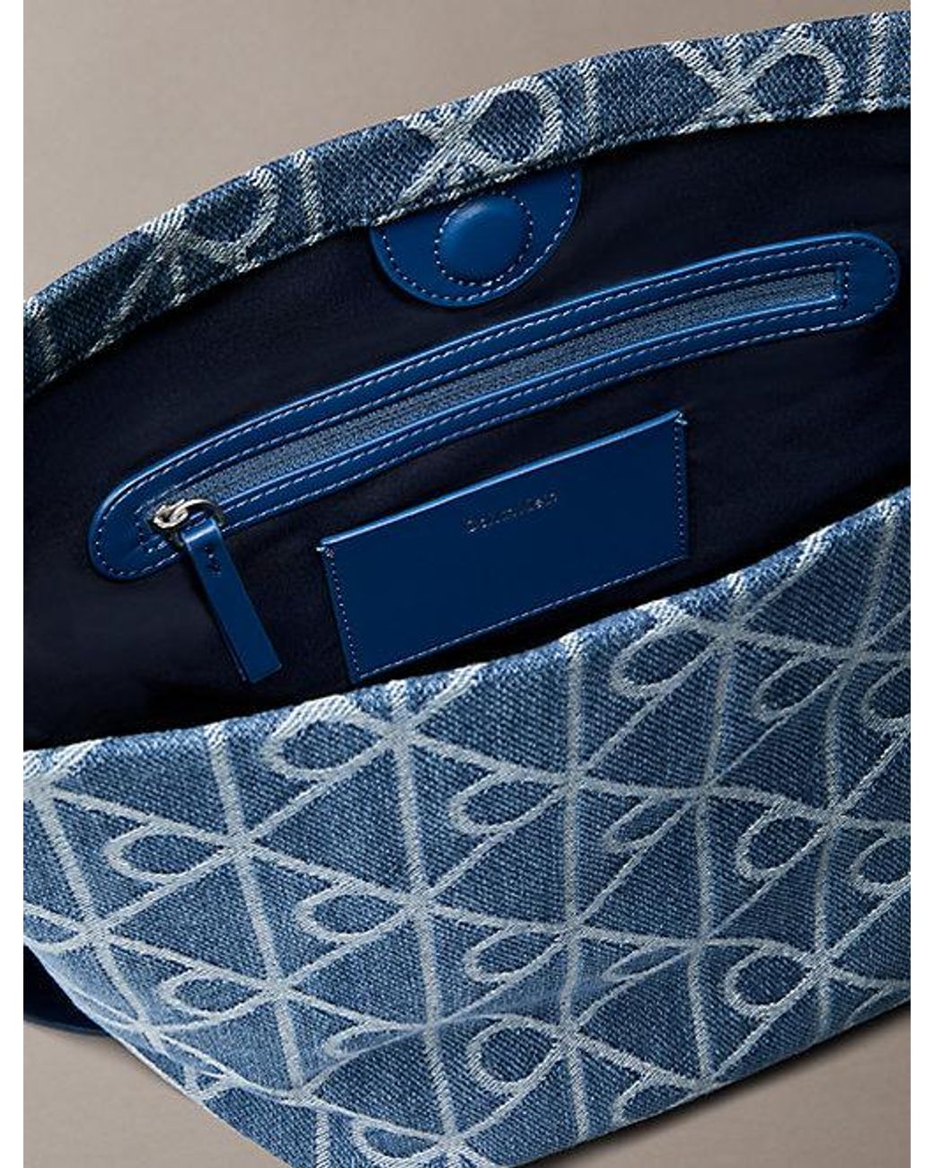 Calvin Klein Blue Denim Allover Emblem Logo Bucket Bag