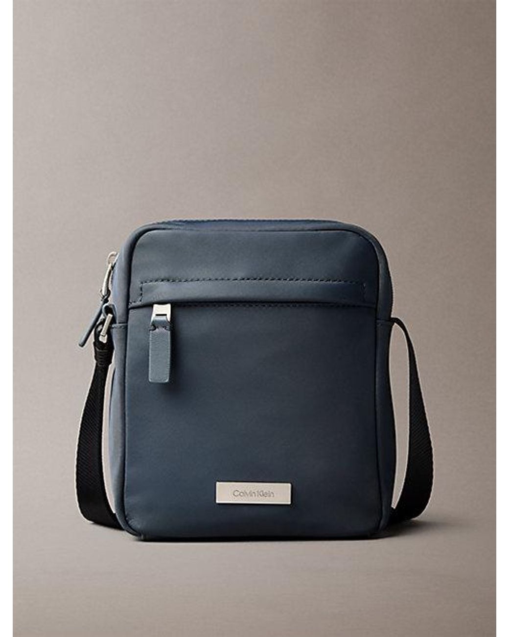 Calvin Klein Blue Water Repellent Nylon Reporter Bag for men