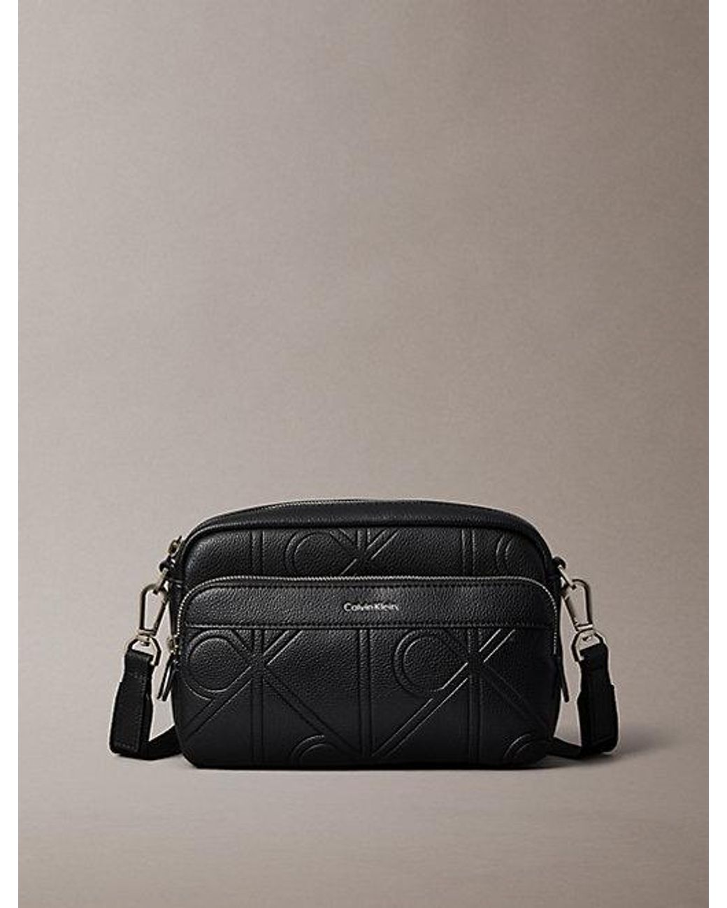 Calvin Klein Black Embossed Emblem Crossbody Camera Bag for men