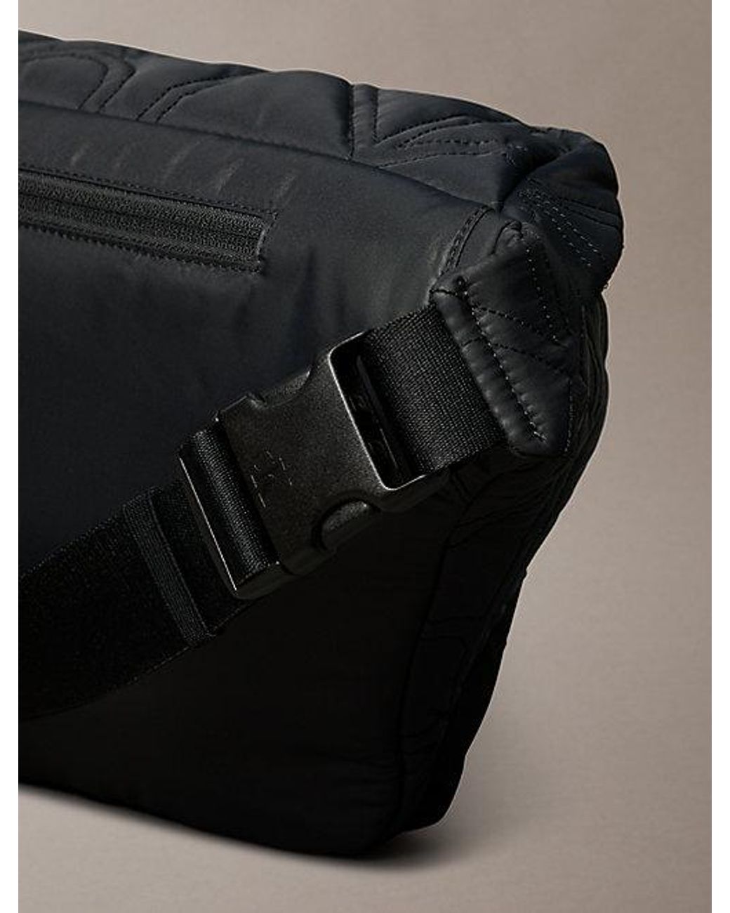 Calvin Klein Gray Puffer Monogram Logo Sling Bag for men
