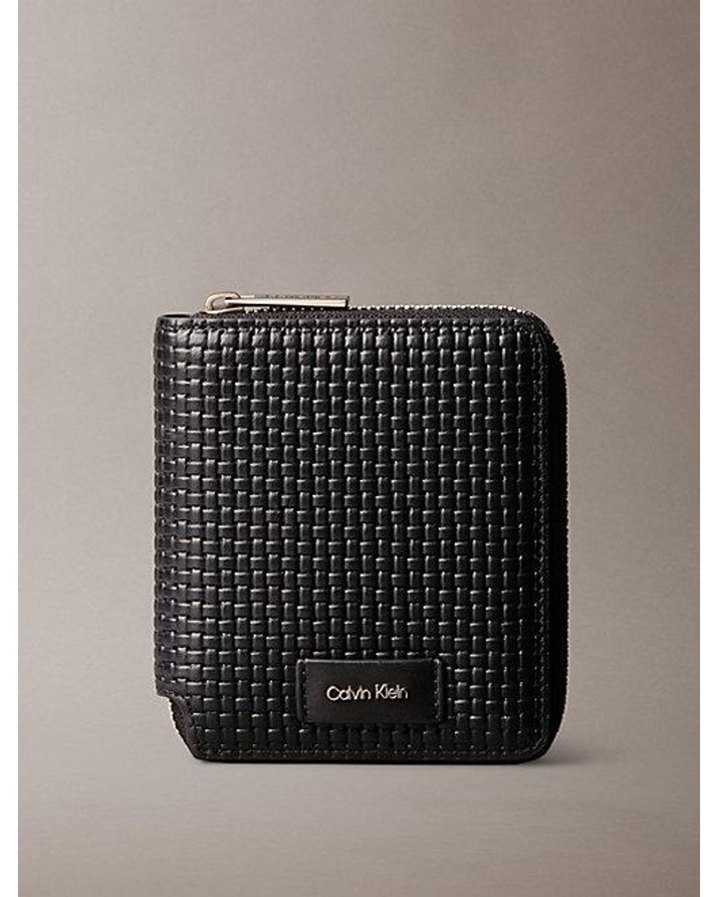 Calvin Klein Black Embossed Woven Zip Billfold Wallet for men