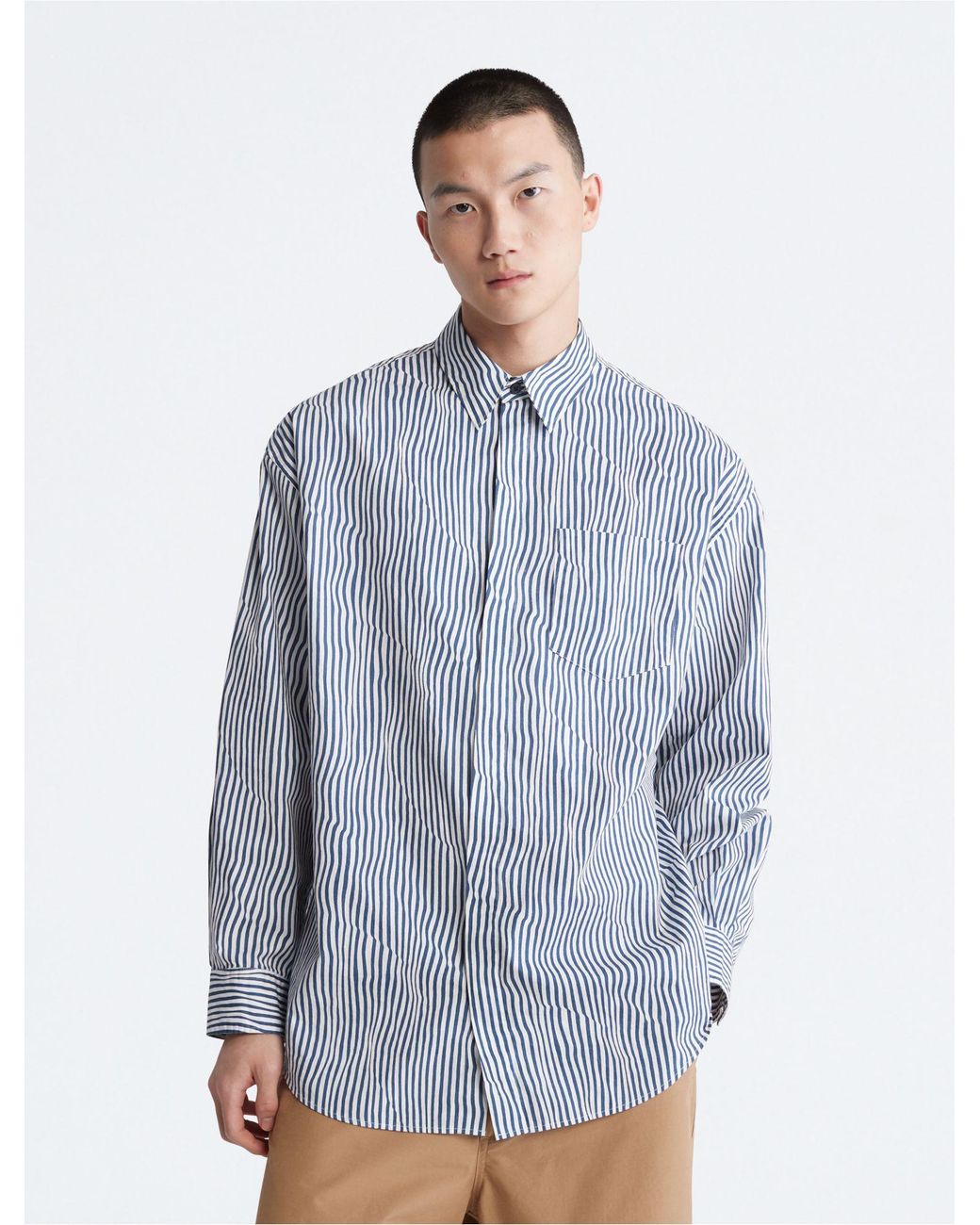Calvin Klein Khakis Oversized Warped Stripe Button Down Shirt in Blue