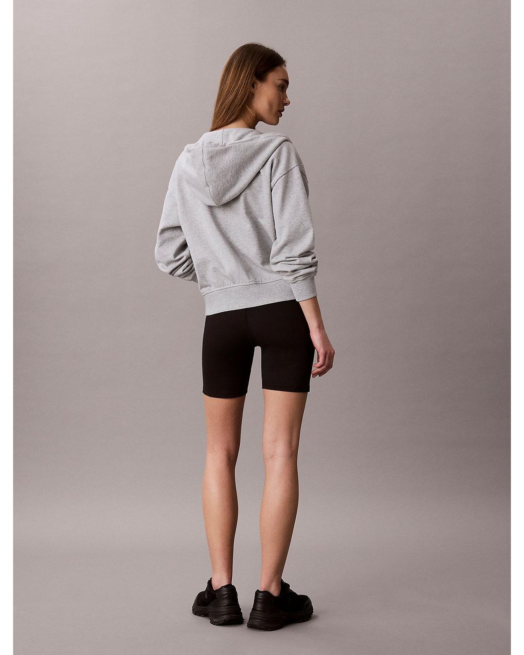 Pantaloncini Da Palestra Alla Coscia A Vita Alta Ad Asciugatura Rapida di Calvin Klein in Brown