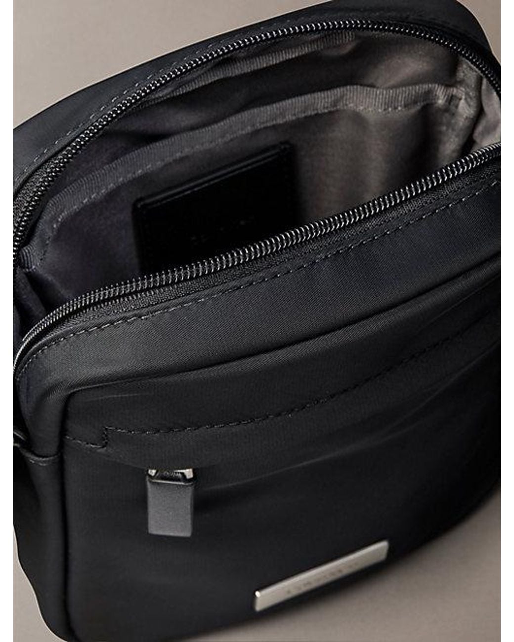 Calvin Klein Black Water Repellent Nylon Reporter Bag for men