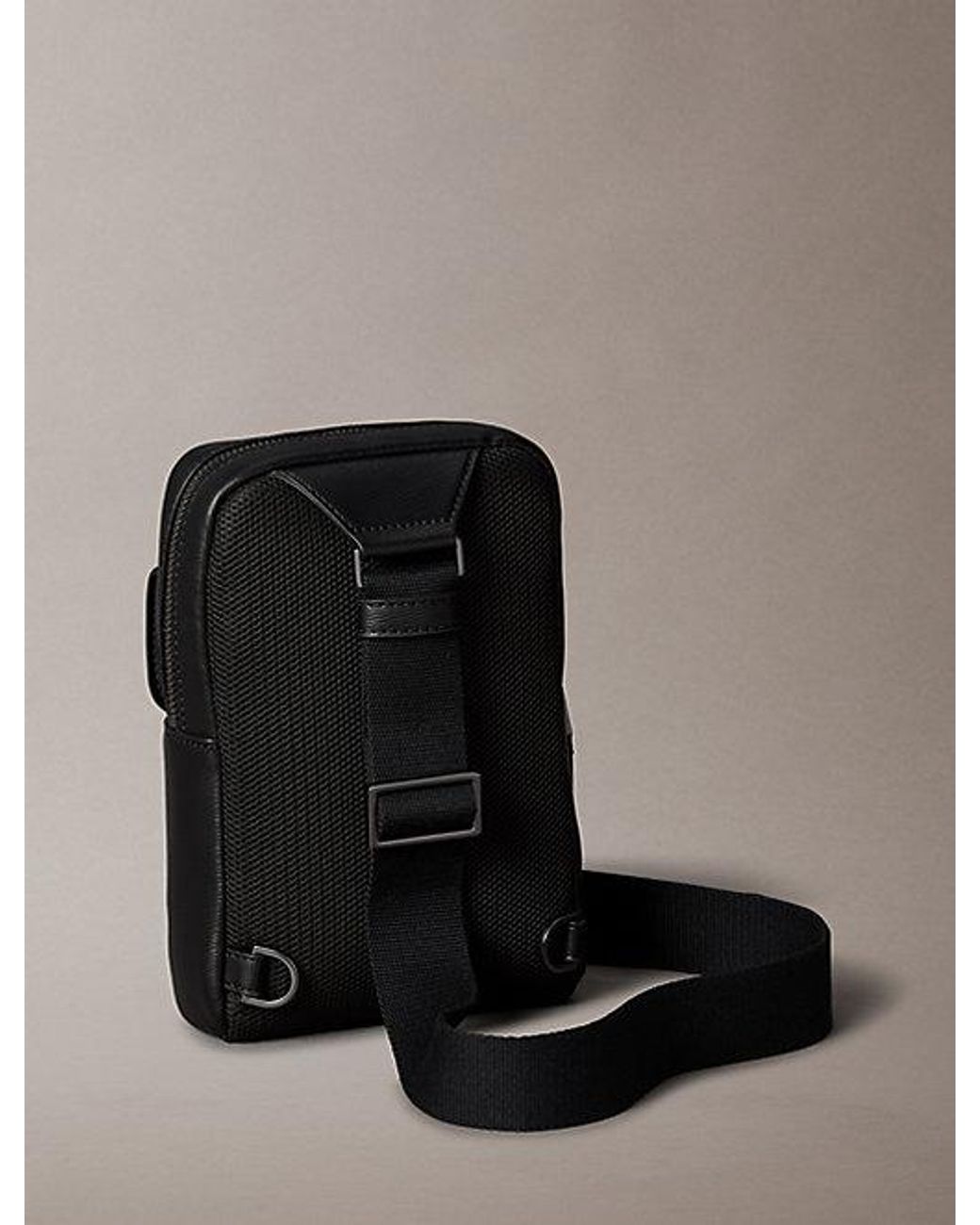 Calvin Klein Black Emblem Logo Sling Bag for men