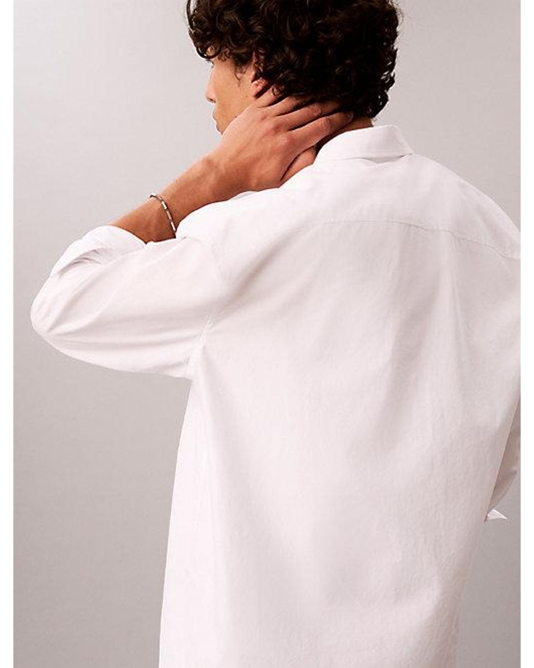 Calvin Klein Blue Jeans Relaxed Graphic Logo Button Down Shirt for men