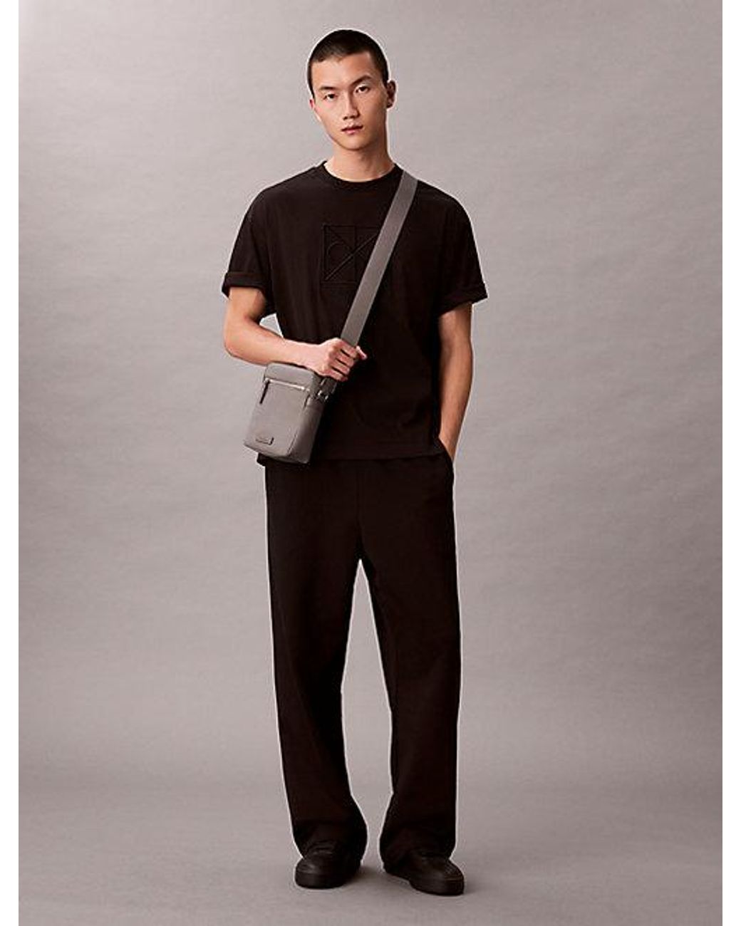 Calvin Klein Gray Embossed Emblem Logo Reporter Bag for men