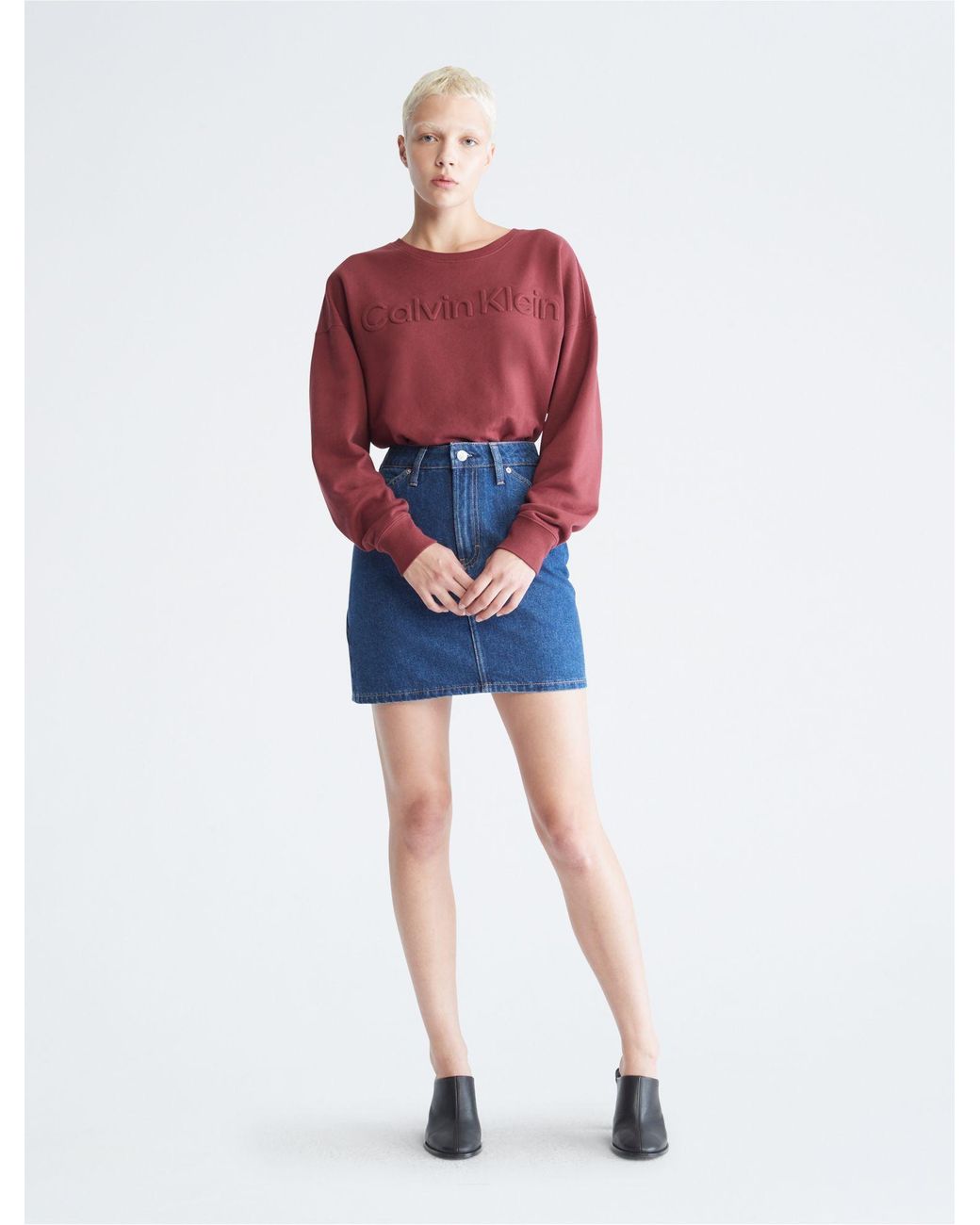 Calvin Klein Oversized Embossed Logo Crewneck Sweatshirt in Red | Lyst