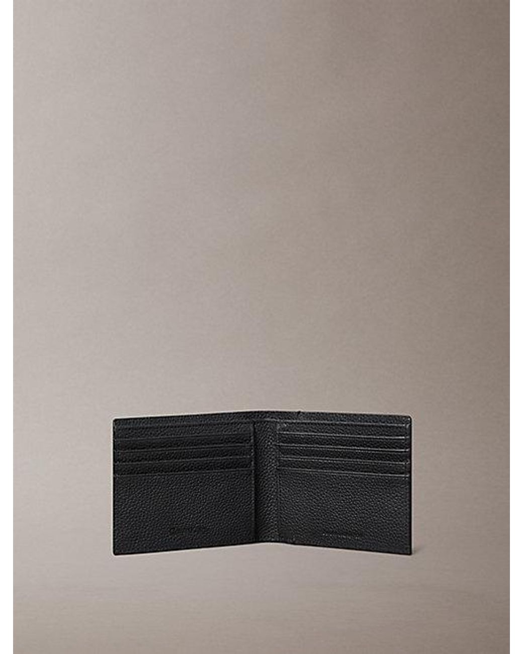 Calvin Klein Gray Foil Embossed Logo Bifold Wallet for men