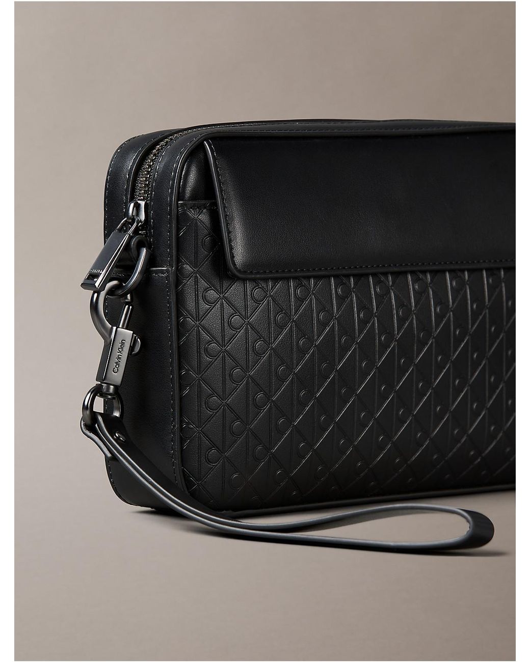 Calvin Klein Gray Allover Emblem Logo Pouch for men