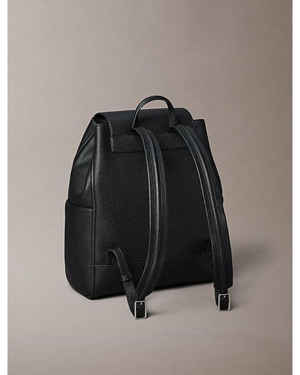 Calvin Klein Gray Emblem Logo Hardware Flap Backpack