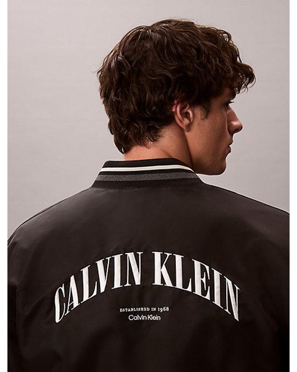 Calvin Klein Black Jeans Varsity Logo Bomber Jacket for men