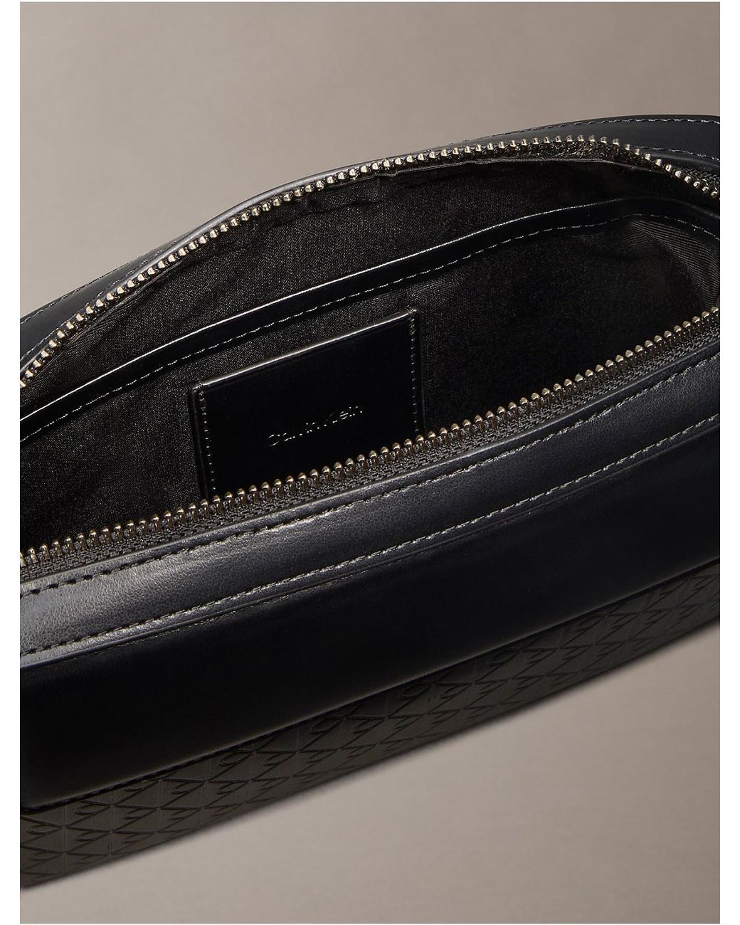 Calvin Klein Gray Allover Emblem Logo Pouch for men